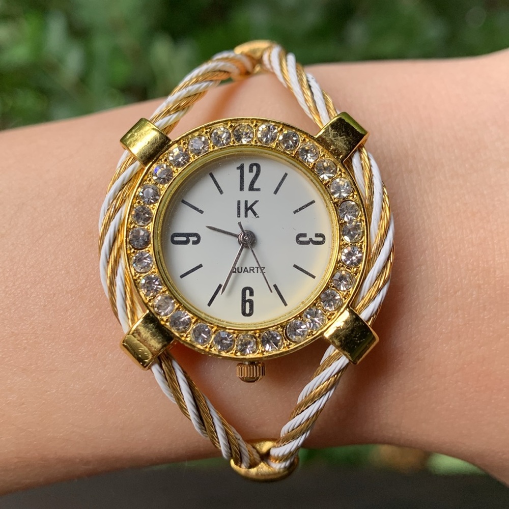 Yellow gold and white cable band bangle watch with rhinestones